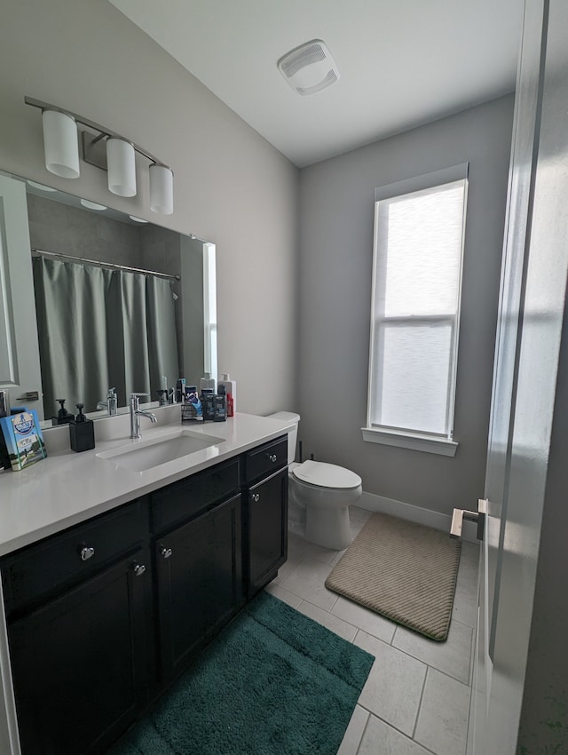 2298 Pondview Ln, Troy, MI 48085 - full bath featuring visible vents, vanity, toilet, a shower with shower curtain, and tile patterned floors