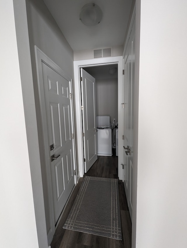 2298 Pondview Ln, Troy, MI 48085 - hallway with visible vents and dark wood finished floors
