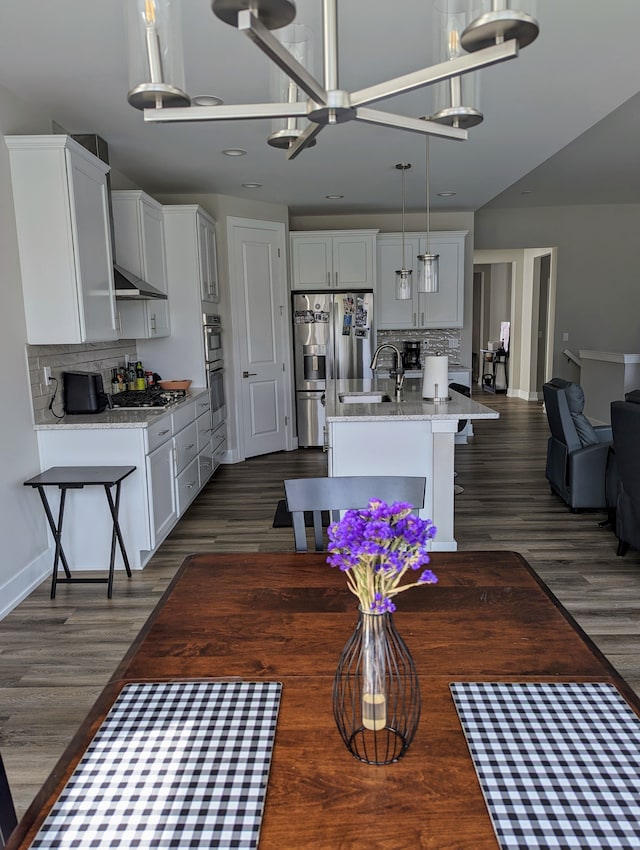 2298 Pondview Ln, Troy, MI 48085 - dining area with recessed lighting, baseboards, and dark wood-style floors