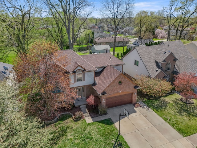 drone / aerial view with a residential view