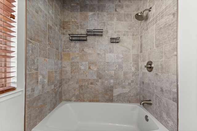 full bath featuring shower / tub combination