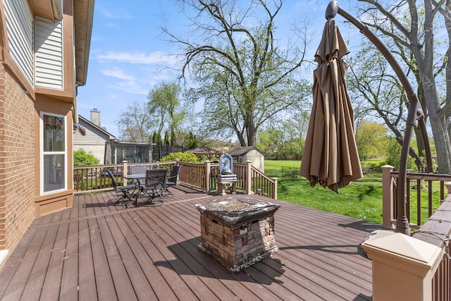 deck featuring outdoor dining area