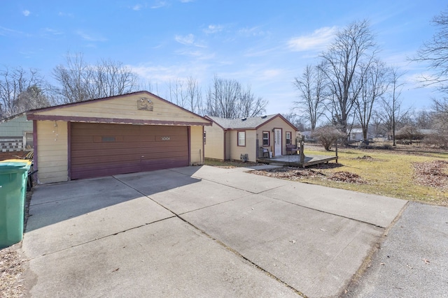 ranch-style home with a garage
