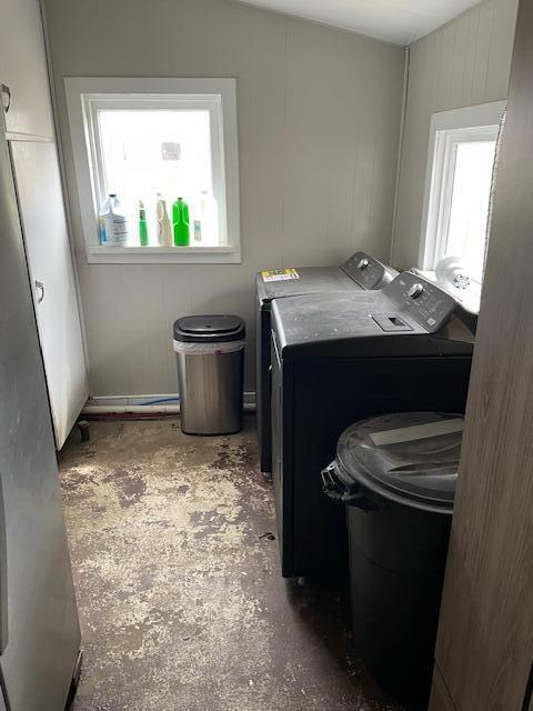 washroom with laundry area and washing machine and clothes dryer