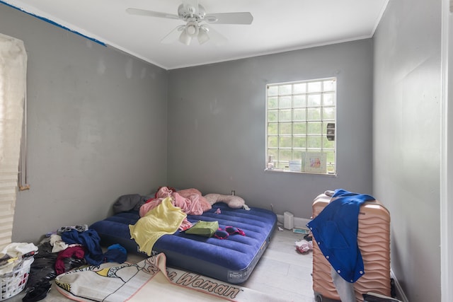 8690 Elmira St, Detroit, MI 48204 - bedroom featuring ornamental molding and a ceiling fan