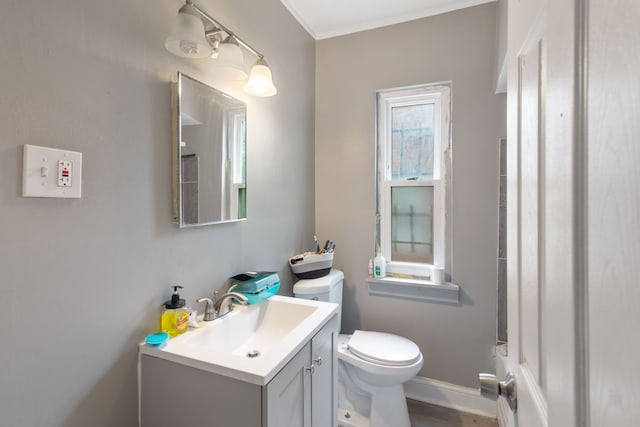 8690 Elmira St, Detroit, MI 48204 - bathroom with toilet, vanity, and baseboards