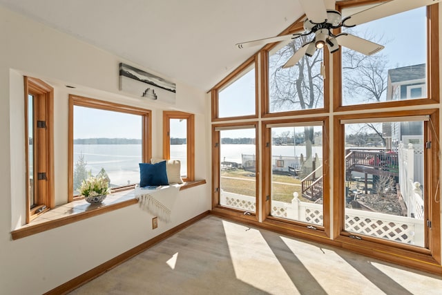 unfurnished sunroom with a water view and a healthy amount of sunlight