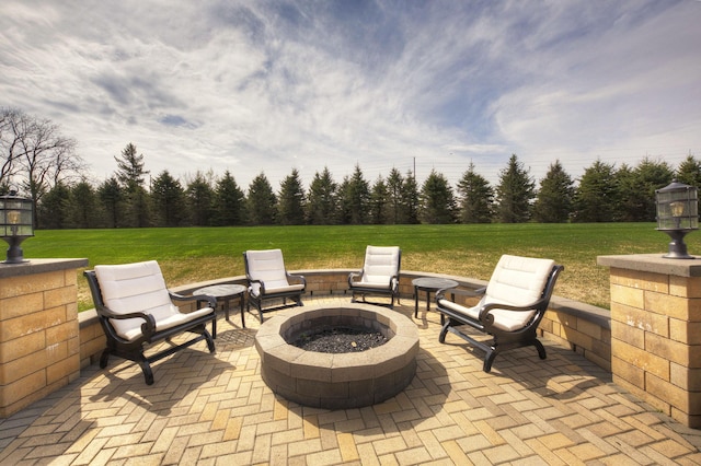 view of patio featuring a fire pit