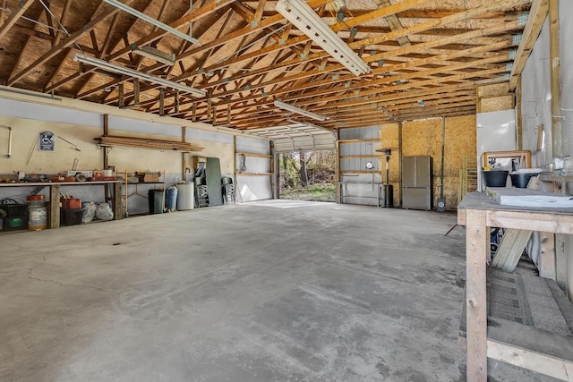 garage featuring freestanding refrigerator