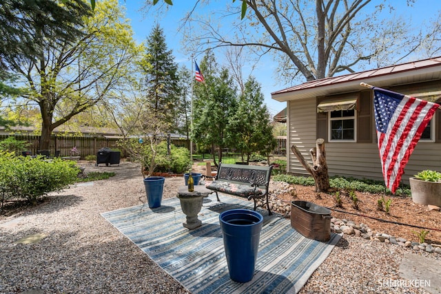 view of patio / terrace with fence