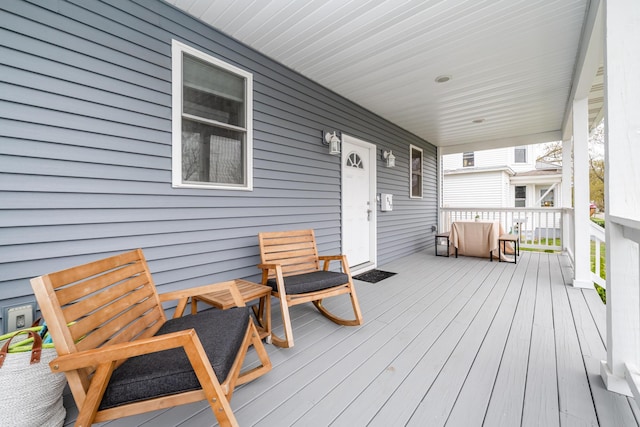 wooden deck with a porch