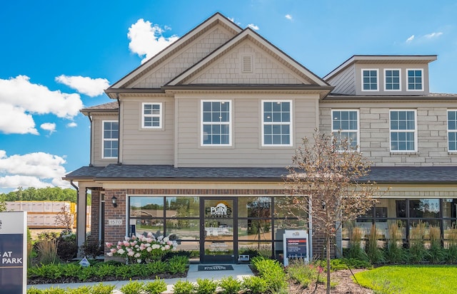 exterior space with brick siding