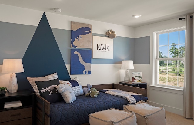 bedroom featuring carpet