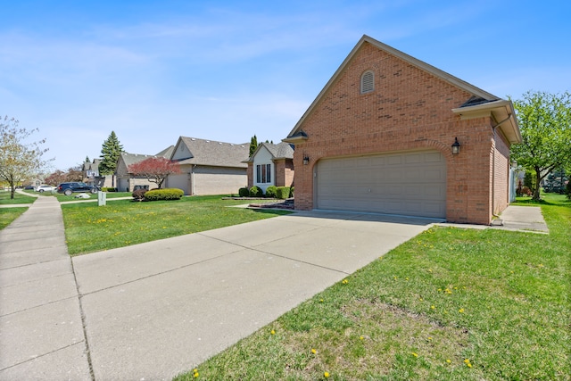 view of front of property with brick siding, a garage, a front yard, and concrete driveway