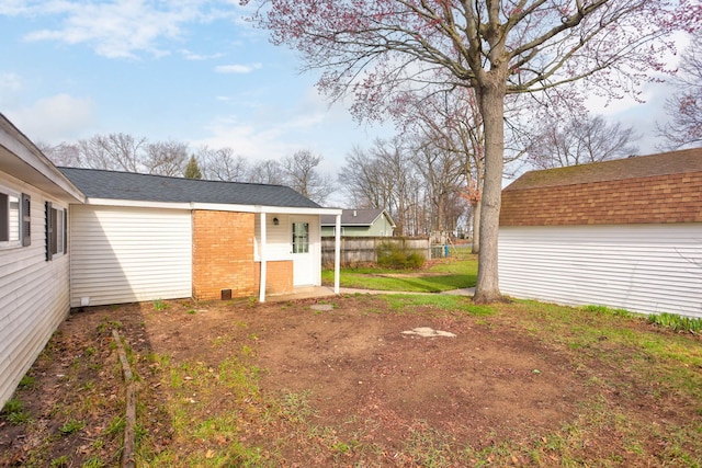 view of yard featuring fence