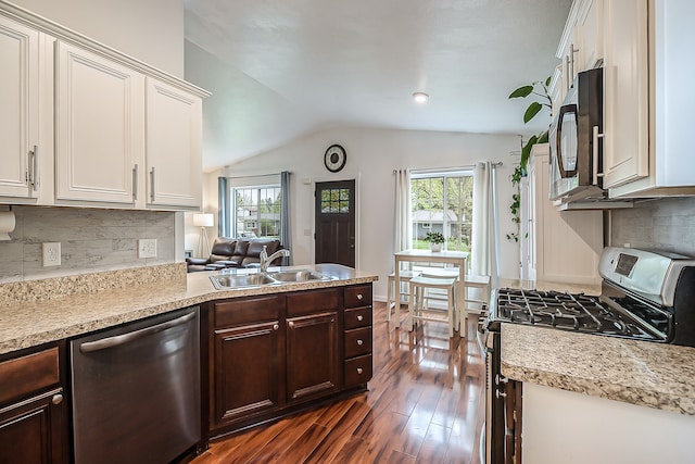 kitchen with plenty of natural light, light countertops, and appliances with stainless steel finishes