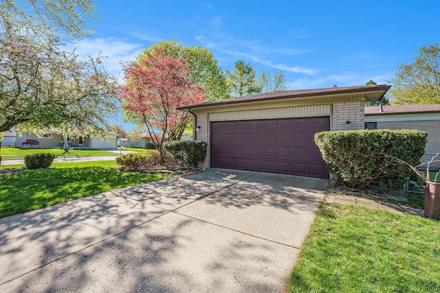 garage featuring driveway