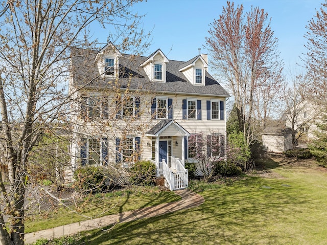 colonial-style house with a front yard