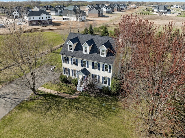 drone / aerial view with a residential view