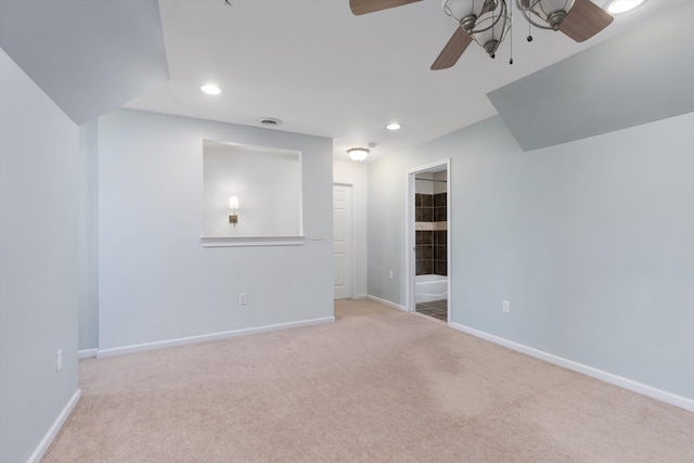 interior space featuring recessed lighting, baseboards, ceiling fan, and light colored carpet