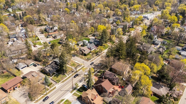 birds eye view of property with a residential view