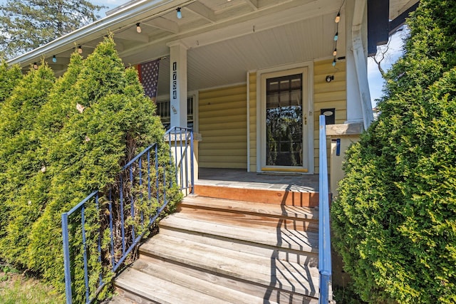 property entrance with a porch