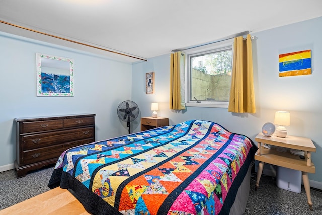 bedroom featuring baseboards