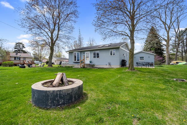 back of property with a yard