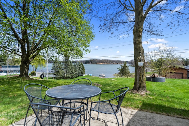 view of patio / terrace with a water view