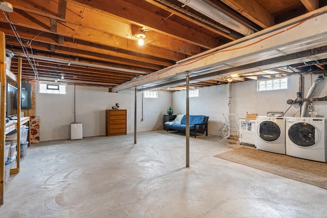 basement with washing machine and dryer