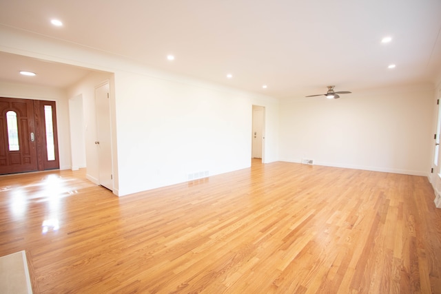 unfurnished living room featuring recessed lighting, light wood finished floors, and ceiling fan