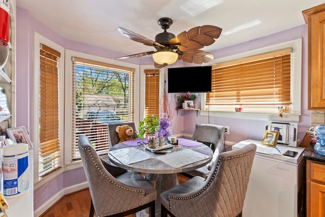 14174 Archdale St, Detroit, MI 48227 - dining room featuring plenty of natural light, a ceiling fan, baseboards, and light wood-type flooring