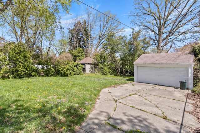 14174 Archdale St, Detroit, MI 48227 - view of yard with a detached garage and an outdoor structure