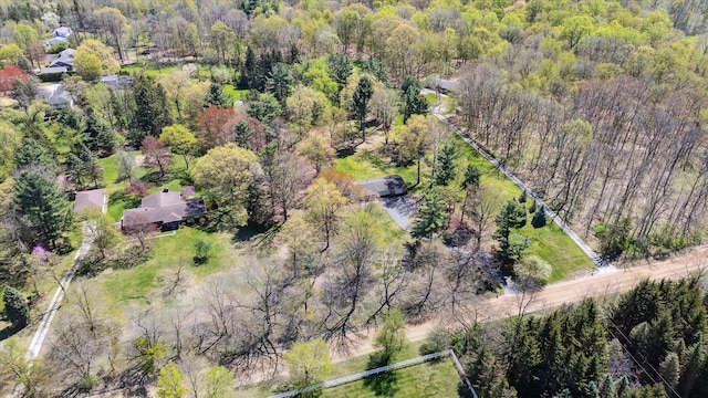 aerial view with a wooded view