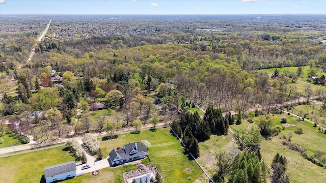 drone / aerial view with a forest view