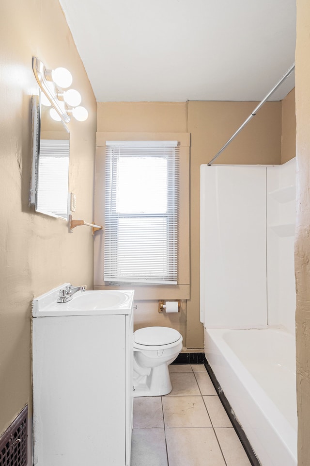 5279 E Somerset Ave, Detroit, MI 48224 - bathroom with toilet, vanity, tile patterned flooring, and bathtub / shower combination
