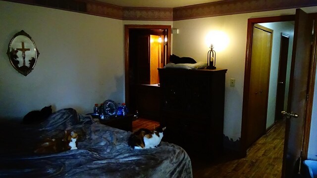 7407 Beecher Rd, Flint, MI 48532 - bedroom with wood finished floors