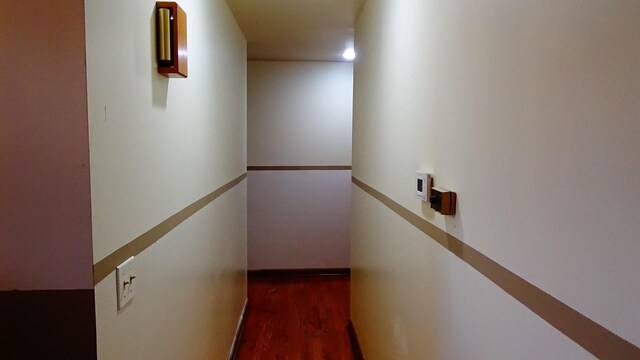 7407 Beecher Rd, Flint, MI 48532 - hallway featuring dark wood finished floors