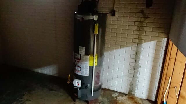 7407 Beecher Rd, Flint, MI 48532 - utility room featuring water heater