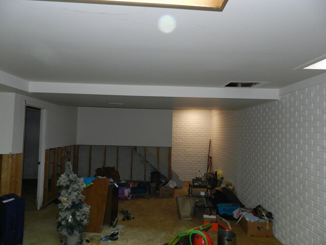 7407 Beecher Rd, Flint, MI 48532 - finished basement featuring brick wall