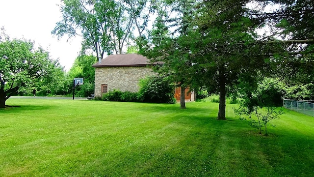 7407 Beecher Rd, Flint, MI 48532 - view of yard featuring an outbuilding