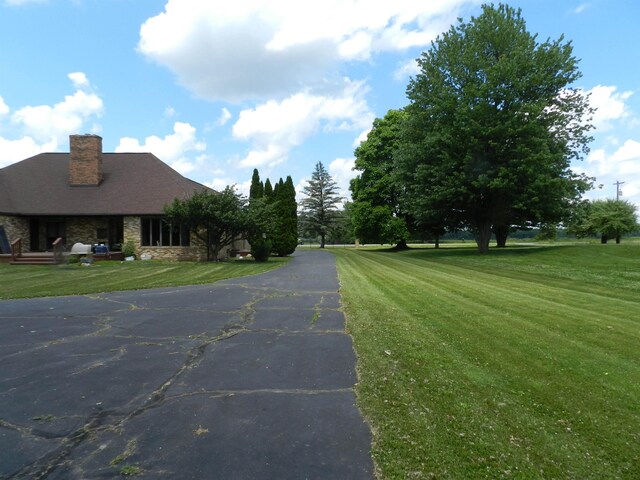 7407 Beecher Rd, Flint, MI 48532 - view of asphalt driveway