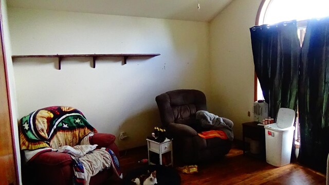 7407 Beecher Rd, Flint, MI 48532 - sitting room with wood finished floors and lofted ceiling