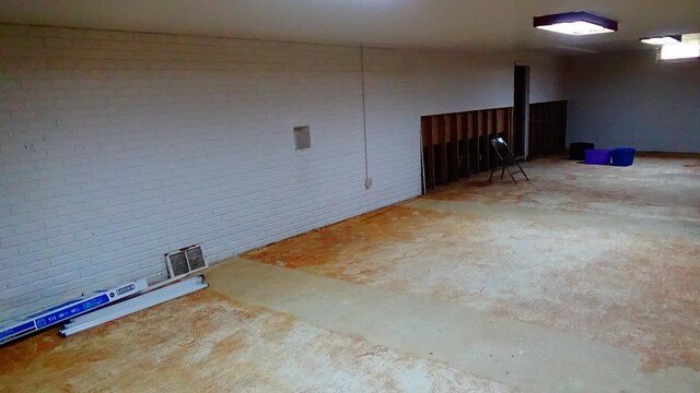 7407 Beecher Rd, Flint, MI 48532 - below grade area featuring brick wall