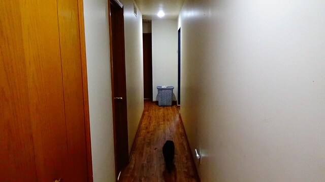 7407 Beecher Rd, Flint, MI 48532 - hall featuring wood finished floors