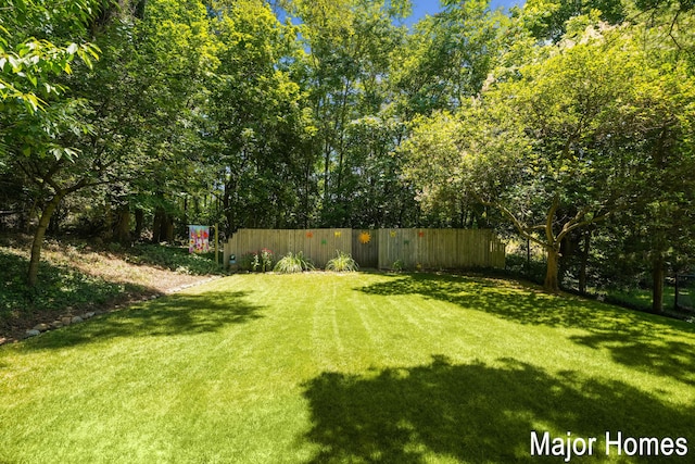 view of yard with fence