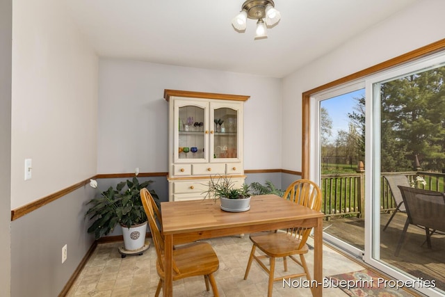 dining space with baseboards