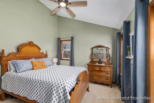 bedroom with a ceiling fan, light carpet, and vaulted ceiling