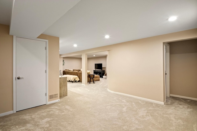 interior space featuring visible vents, carpet flooring, baseboards, and recessed lighting