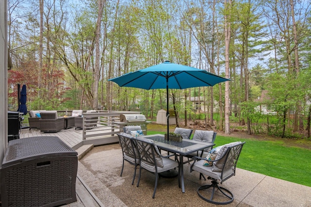 view of patio featuring grilling area, an outdoor living space, and outdoor dining area